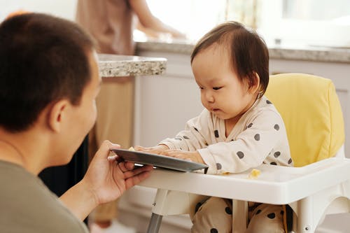 Toddler Engaged with Tablet